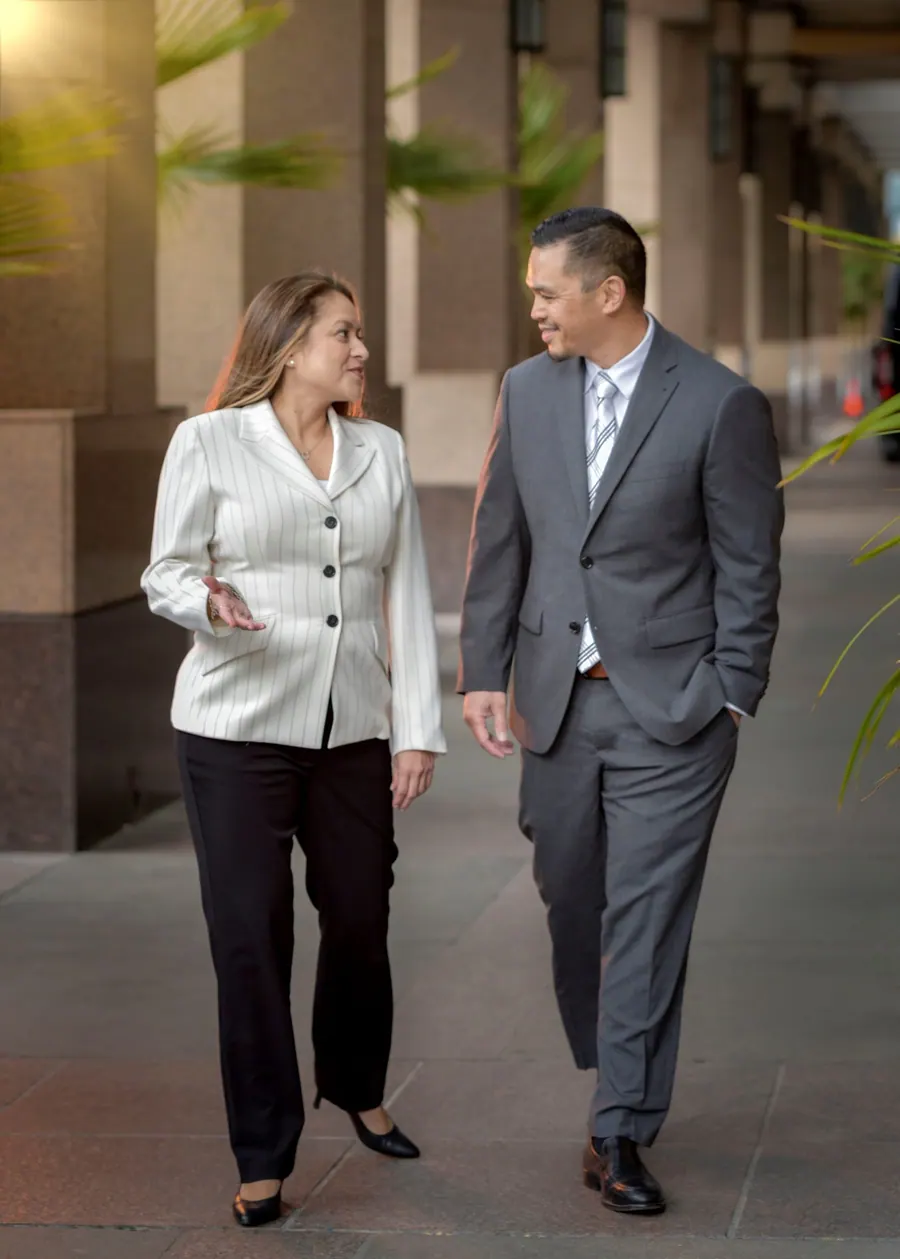 Mark and Joy Taylan walking together downtown